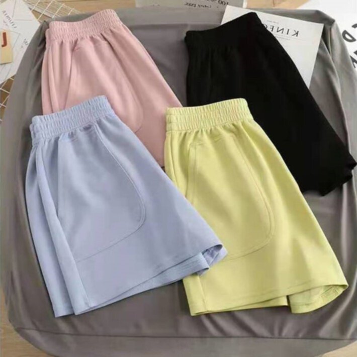 High waisted loose fitting solid color women's sports shorts